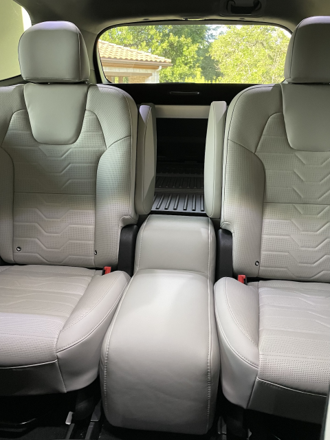 Fill gap between second row captain s chairs Kia Telluride Forum